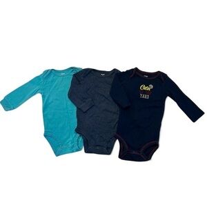 Carter’s long sleeved onesies size 9 months